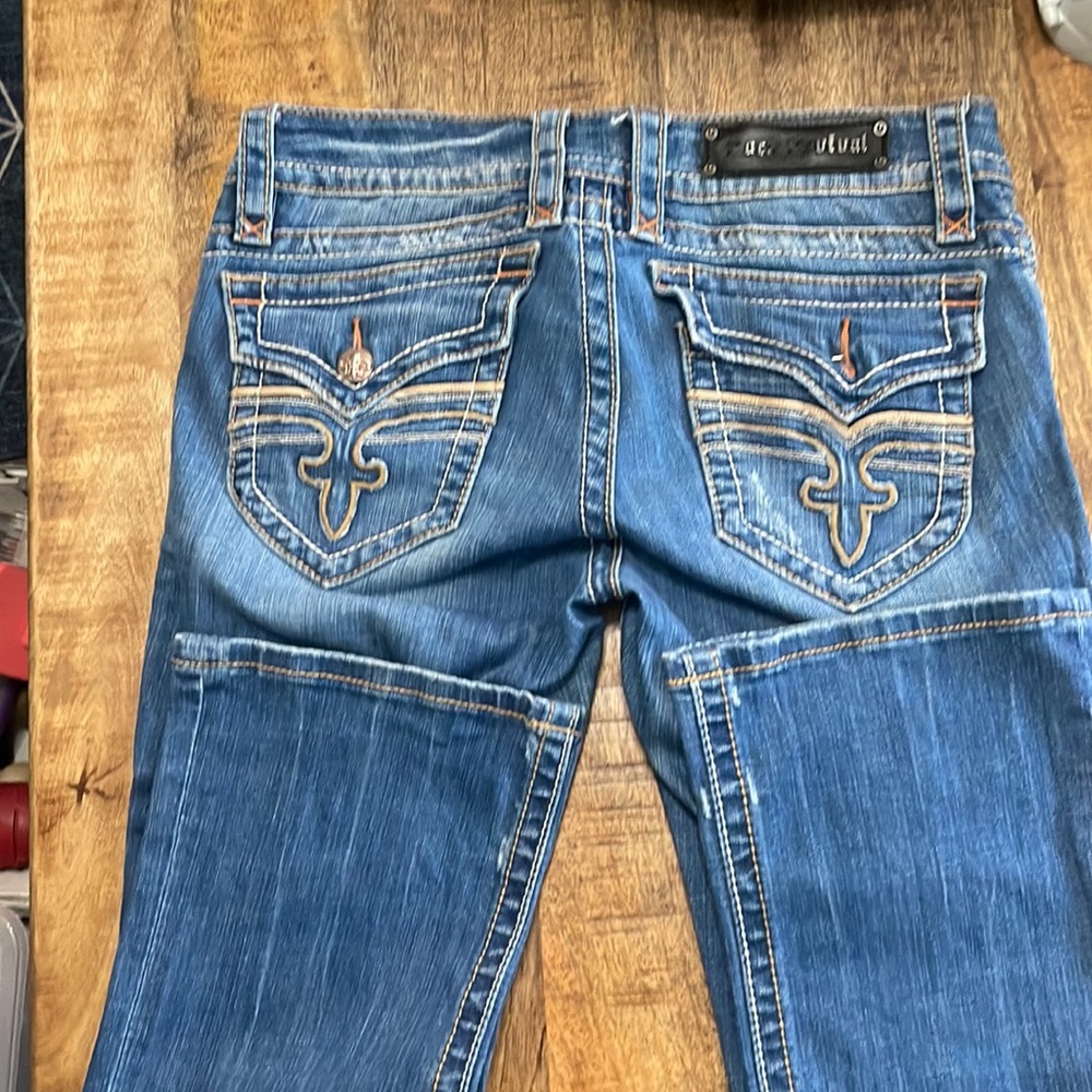 Rock revival jeans missing a button on the pocket